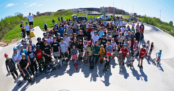 Group of young skateboard and scooter users at Cranbrook Skate Park