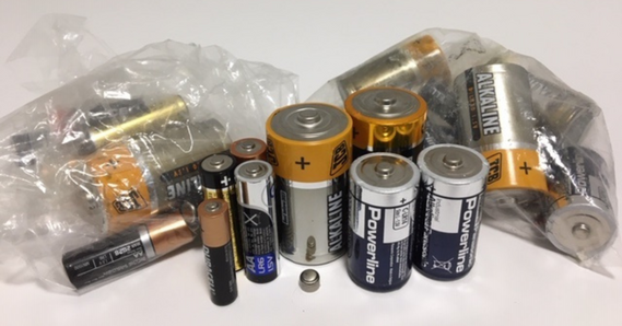 Selection of batteries, with some in plastic bags