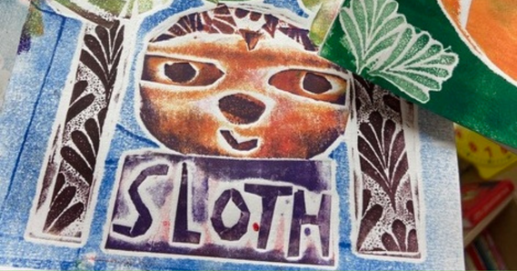 Print with a sloth illustration and text