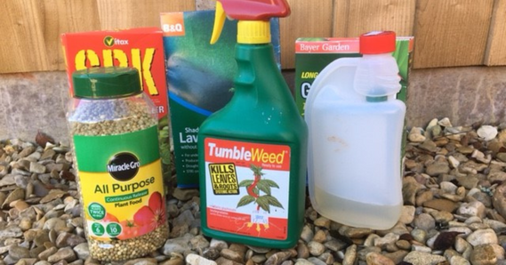 Containers of weed killer and plant food