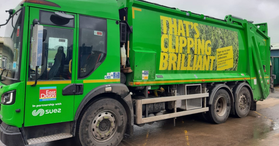 Green waste vehicle with 'that's clipping brilliant' on the side