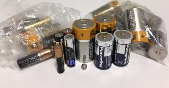 Batteries, some inside and some outside clear plastic bags