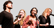 Four people with microphones