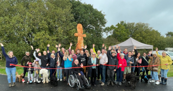 Visitors to Clyst Meadows join a ribbon-cutting ceremony to celebrate the opening of Clyst Meadows