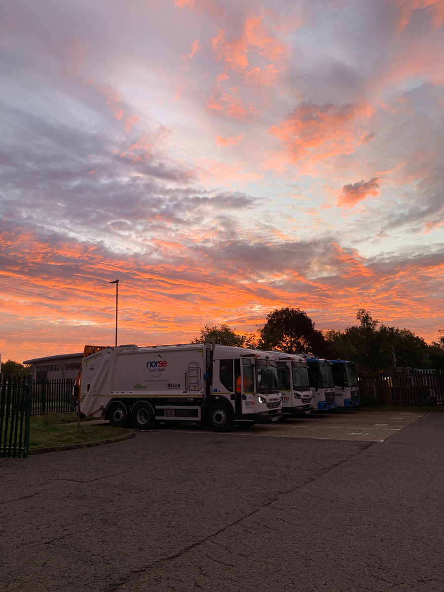 Sunrise over bin lorries