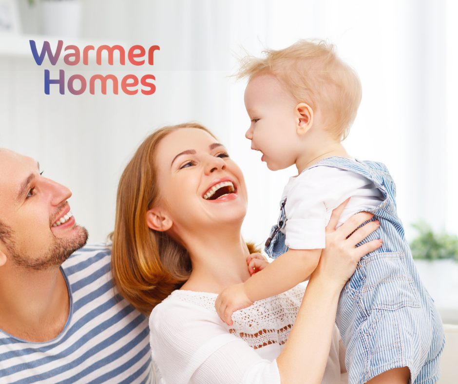 Warmer Homes happy family image