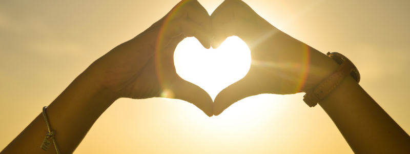 Hands making shape of a heart