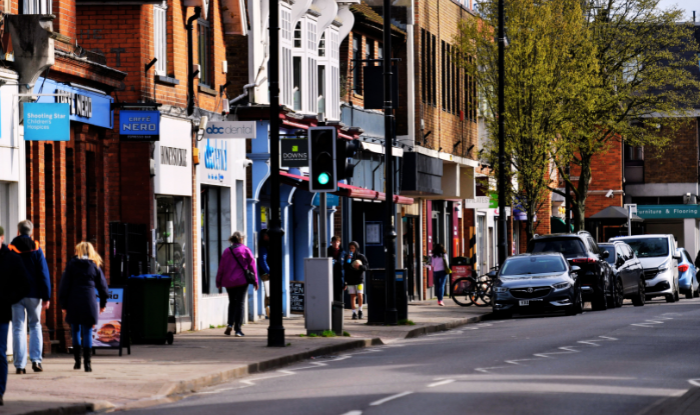 People walking along Cobham High Street