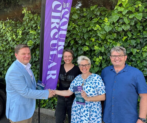 Cllr Robin Stephens with the team from The Court Circular who are holding flyers and promoting the new market.