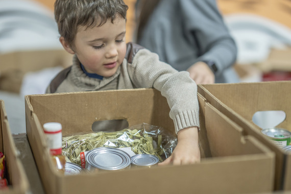 Child with food in a box
