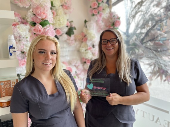 Employees at Sparkle with Beauty in Hersham holding their Love Elmbridge Award
