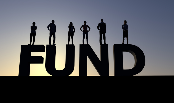 A silhouette of people standing on the word Funding one person on each letter