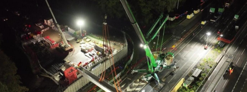 Cranes on Wisley bridge at night