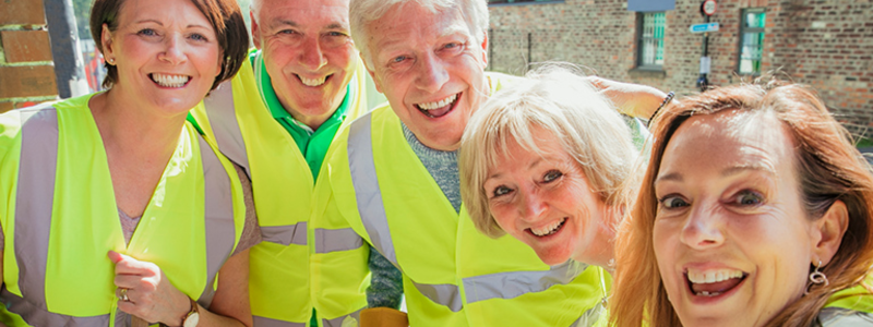 Group of 4 people in hi-vis jackets