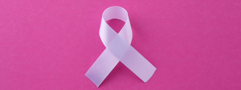 White ribbon on a pink background