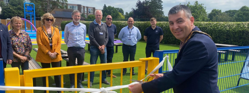 Mayor cuts ribbon opening the Weybridge Splash Pad