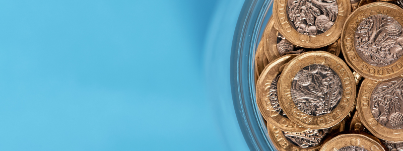 Cost of living fund - glass jar filled with £1 coins
