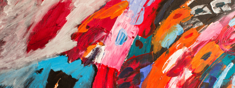 Abstract coloured art using pink, blue, white, red and white paints