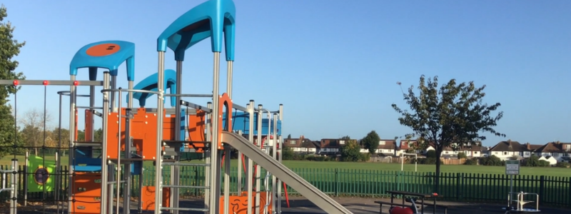 Children's play equipment including a slide in a play area