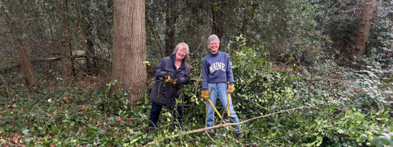 Two ladies volunteering at countryside setting