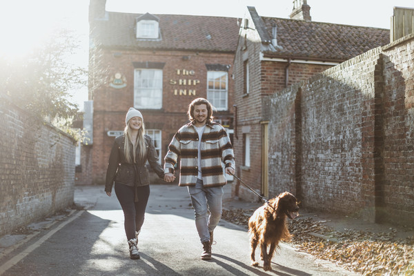 Couple and dog walking in East Yorkshire