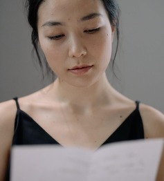 woman reading letter