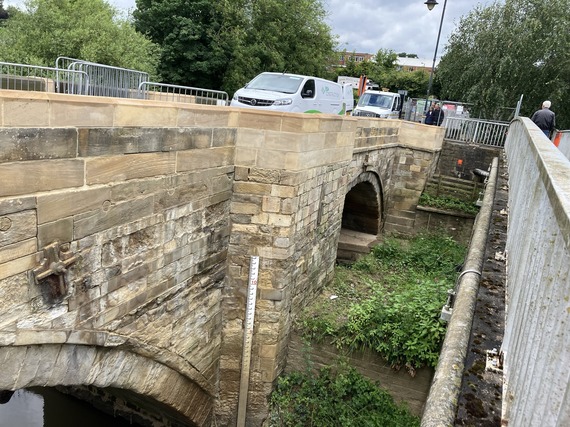 Pointing on the exterior of the bridge
