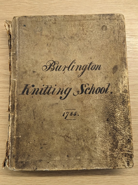 Front cover of the Burlington Knitting School account book