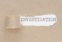 An image of the word "INVESTIGATION"