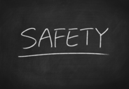 An image of the word "SAFETY" written on a chalkboard