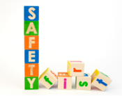 A photo of colourful blocks spelling "SAFETY FIRST"