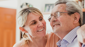 woman helping father