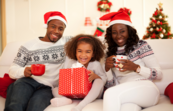 A photo of a family smiling at Christmas
