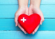 Hands holding a heart 