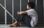 A photo of a child looking isolated