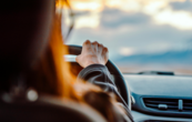 A photo of a person driving a car