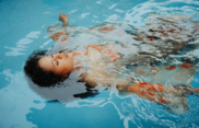 A photo of a woman floating