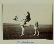 Photograph of Ambrose Gorham mounted 'on his favourite grey Peccavi', c1904