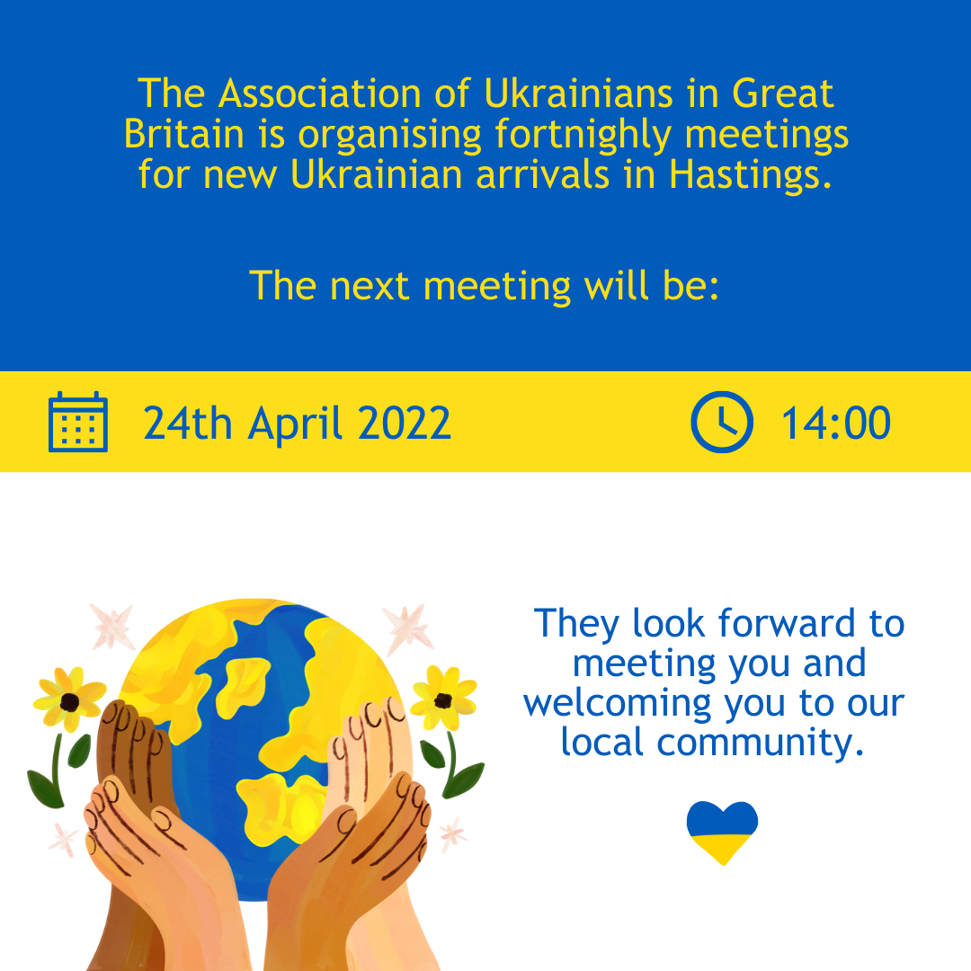 Hands over the globe in Ukraine colours