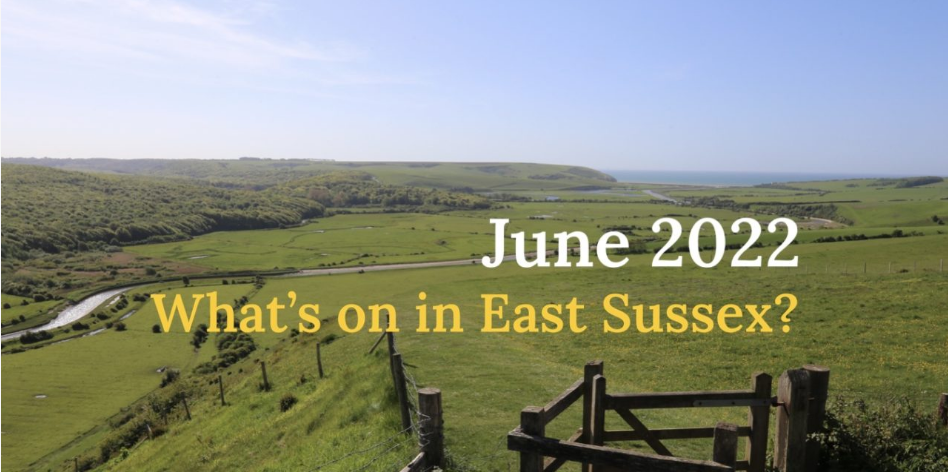 A panoramic view of East Sussex countryside, looking out to the sea. 'What's on in East Sussex' is written in yellow across the image.
