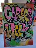 Graffiti saying carers week made by young carers at a workshop