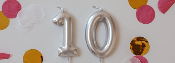 Silver candles in the number 10