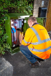 Gigaclear engineer working at a fibre cabinet