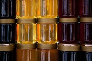 Jars of different coloured honey 