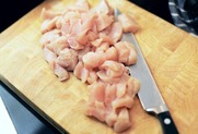Chopped chicken on a chopping board