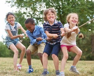 Kids playing tug of war