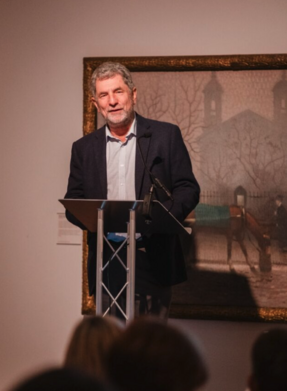 Man stood at a lectern