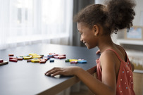 Girl doing a puzzle