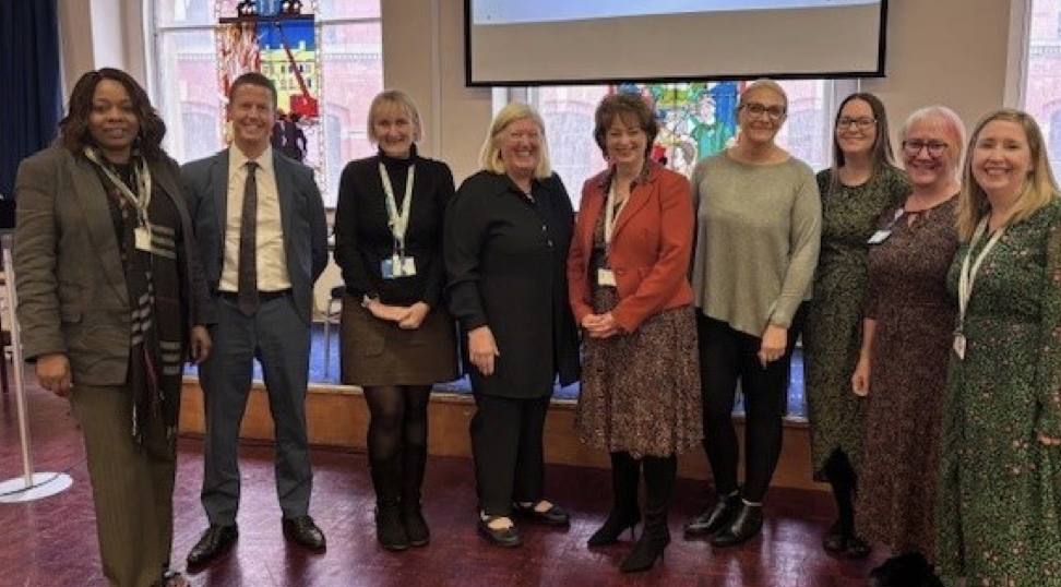 Group photo of some of the attendees at the palliative and end of life care event, including members of the network.