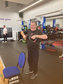 Photo of man taking part in a pulmonary rehabilitation session.